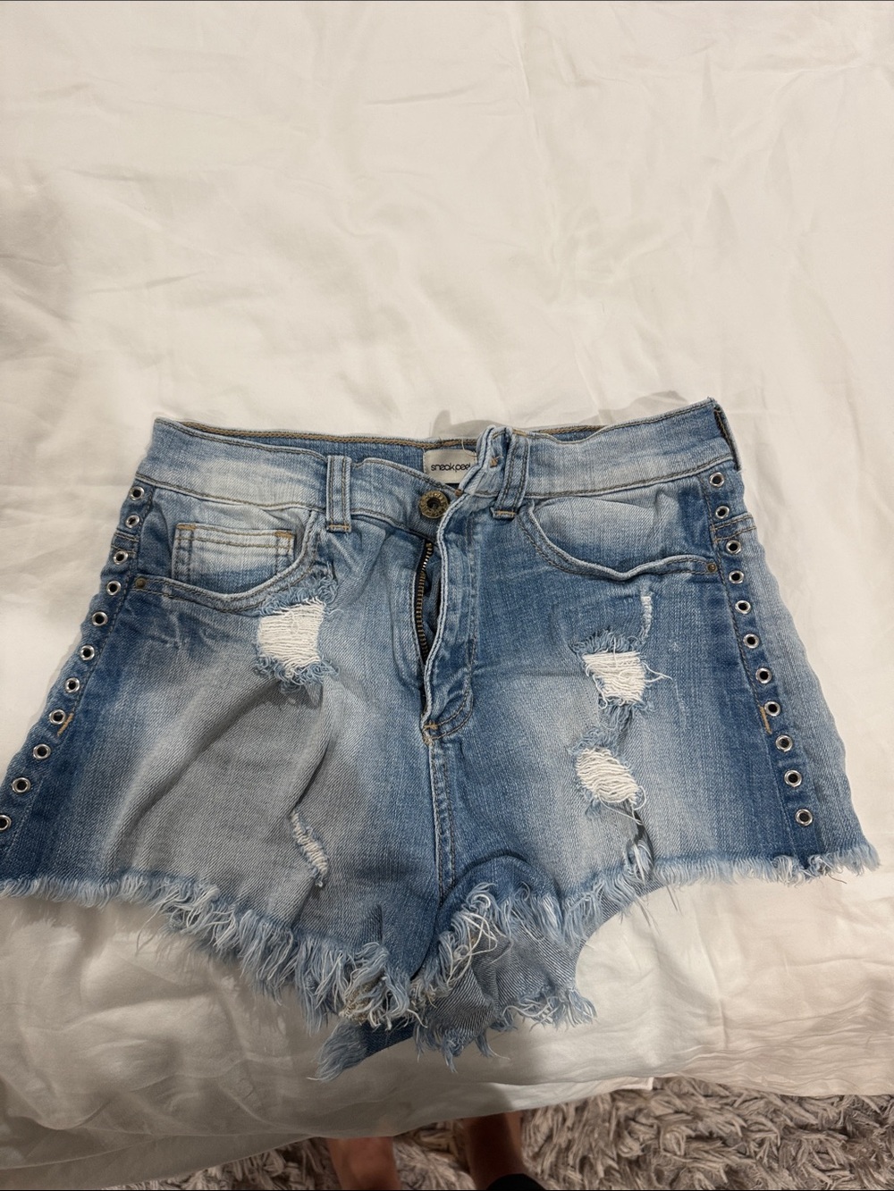 Sneak Peek Light Blue Distressed Denim Shorts with Grommet Trim